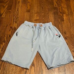 Light Blue Athletic Shorts with Elastic Waistband and Soft Cotton Fabric